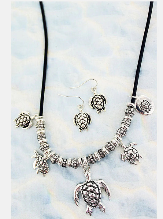 SILVERTONE TURTLE SLIDING BEAD CORD NECKLACE AND EARRING SET