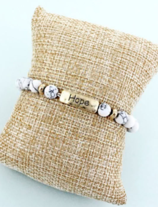 Crystal ave, gold tone ‘hope’ bar white semi stone bead bracelet