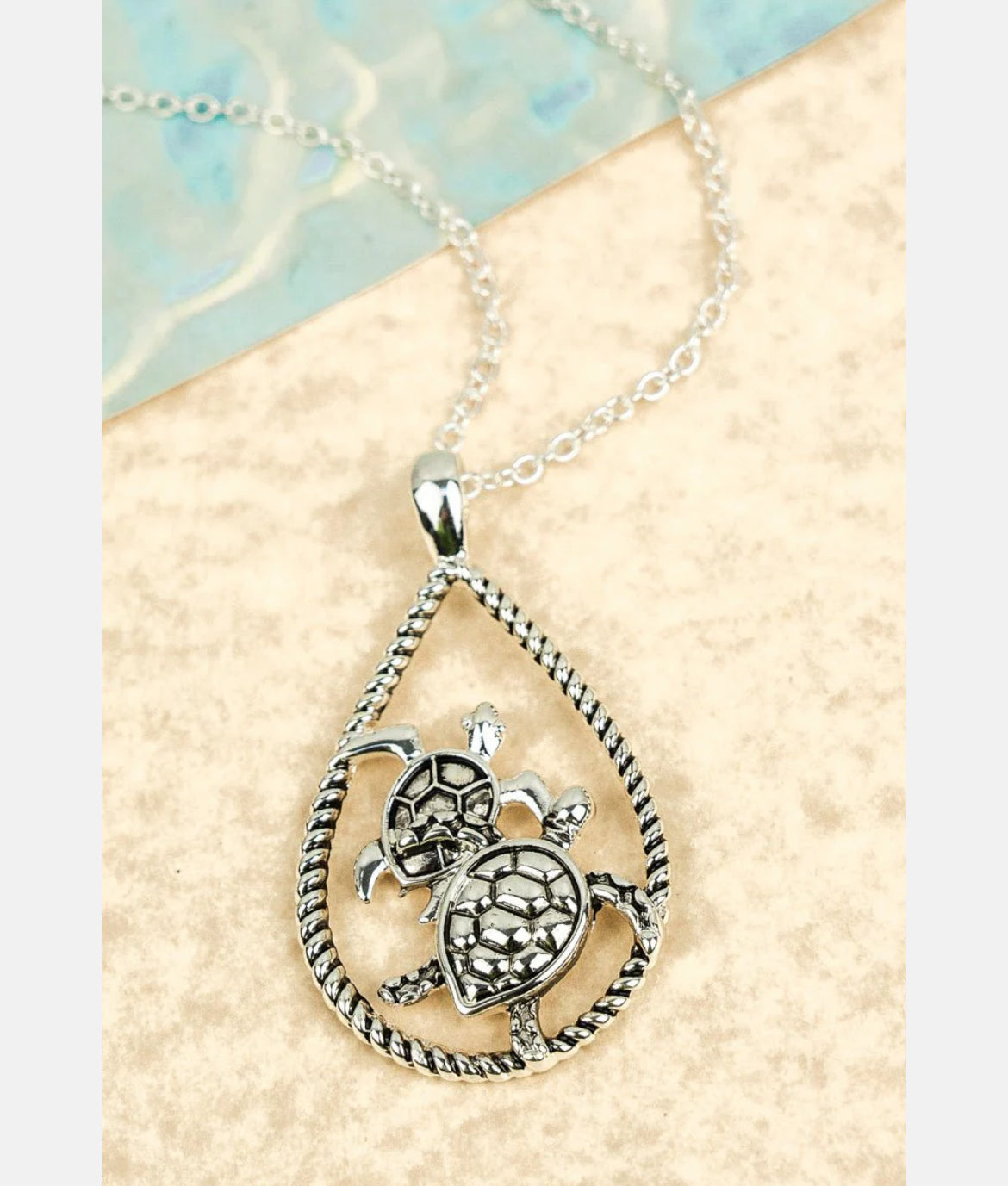 SILVERTONE TURTLE DUO TEARDROP NECKLACE